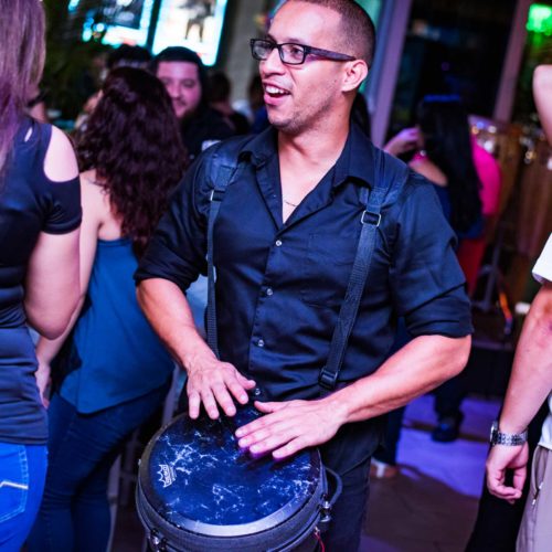 Musician playing the portable drum